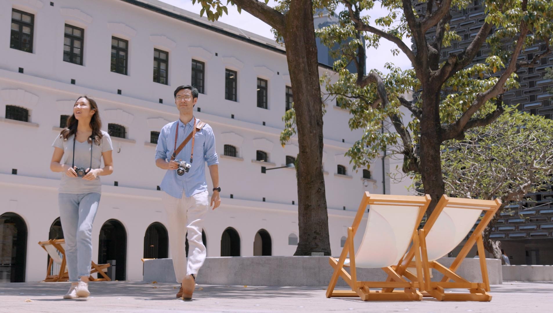 Jamie Ha walks across the Tai Kwun Parade Grounds in Hong Kong